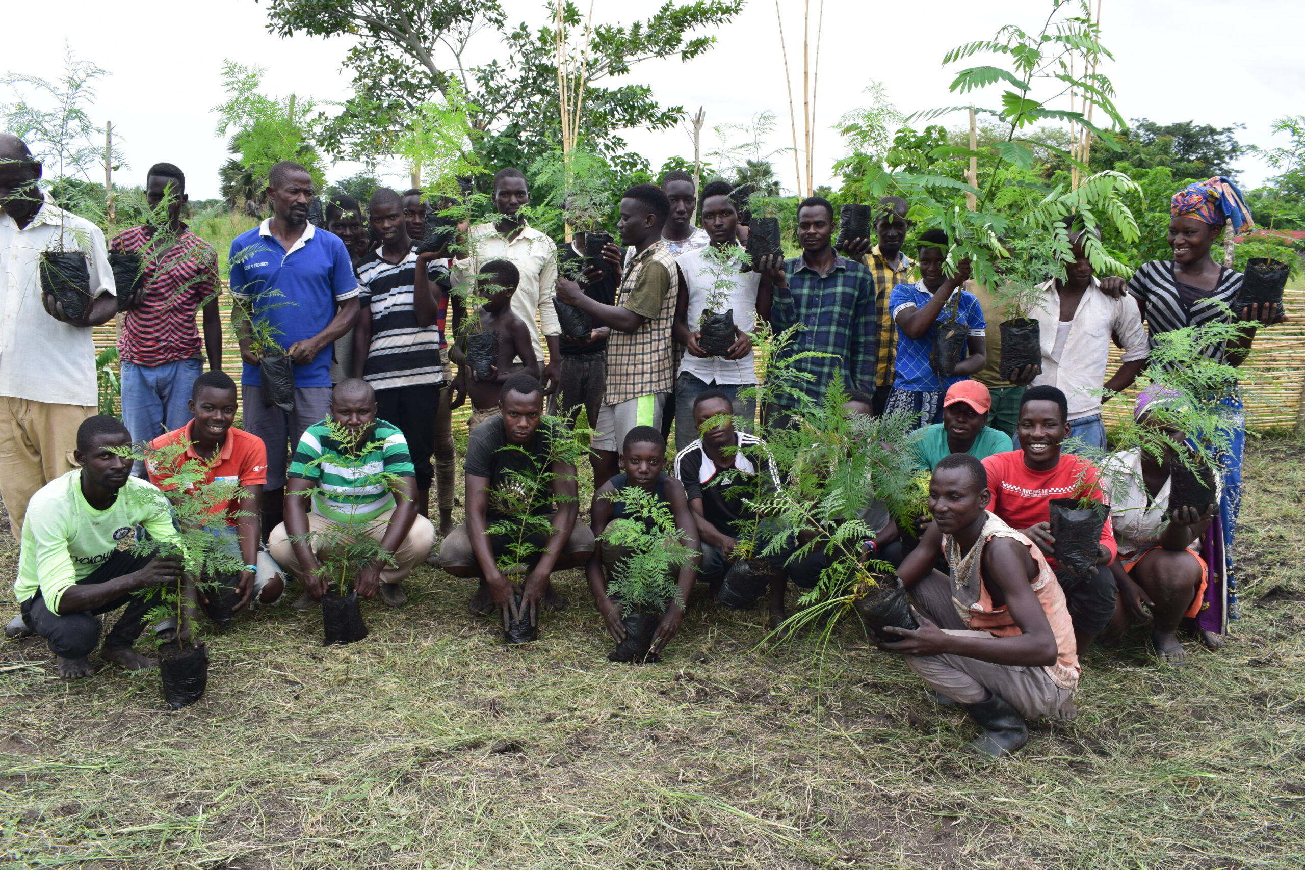 Community members working on a sustainable water management project in the Albertine Region
